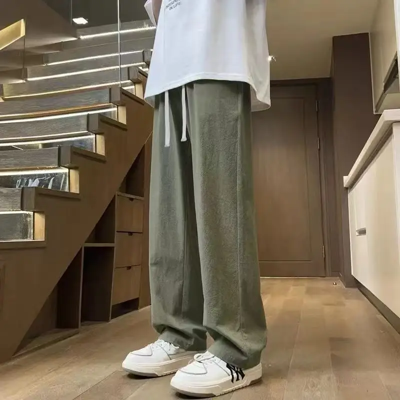 Sd48671cce7f14a6caa8475df6b5c4ac3t.webp Casual Trousers for Men's Summer New Ice Silk Trendy Sports Loose Straight Tube for Men - Image 1