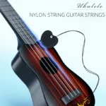 Music-orientated children's guitar toy that can be played with a pick to imitate basic musical instruments, resembling a ukulele - Image 3