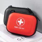 Portable First Aid Kit in Hard Shell Case with Carabiner Clip & Compact Emergency Medical Bag for Home, Outdoor, Travel, Cam;’&*